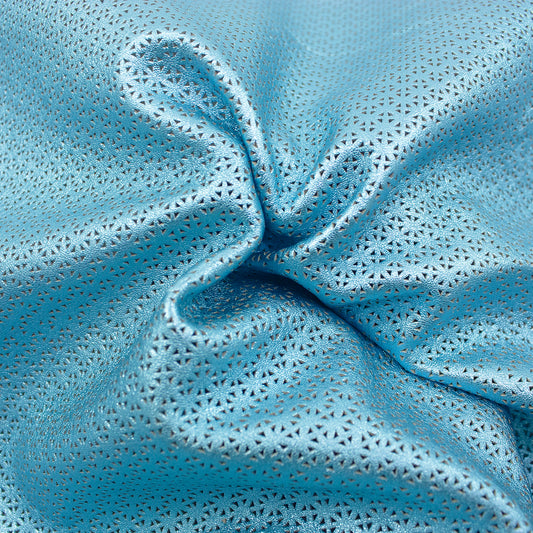 Trozo de piel fantasia perforada mosaico azul