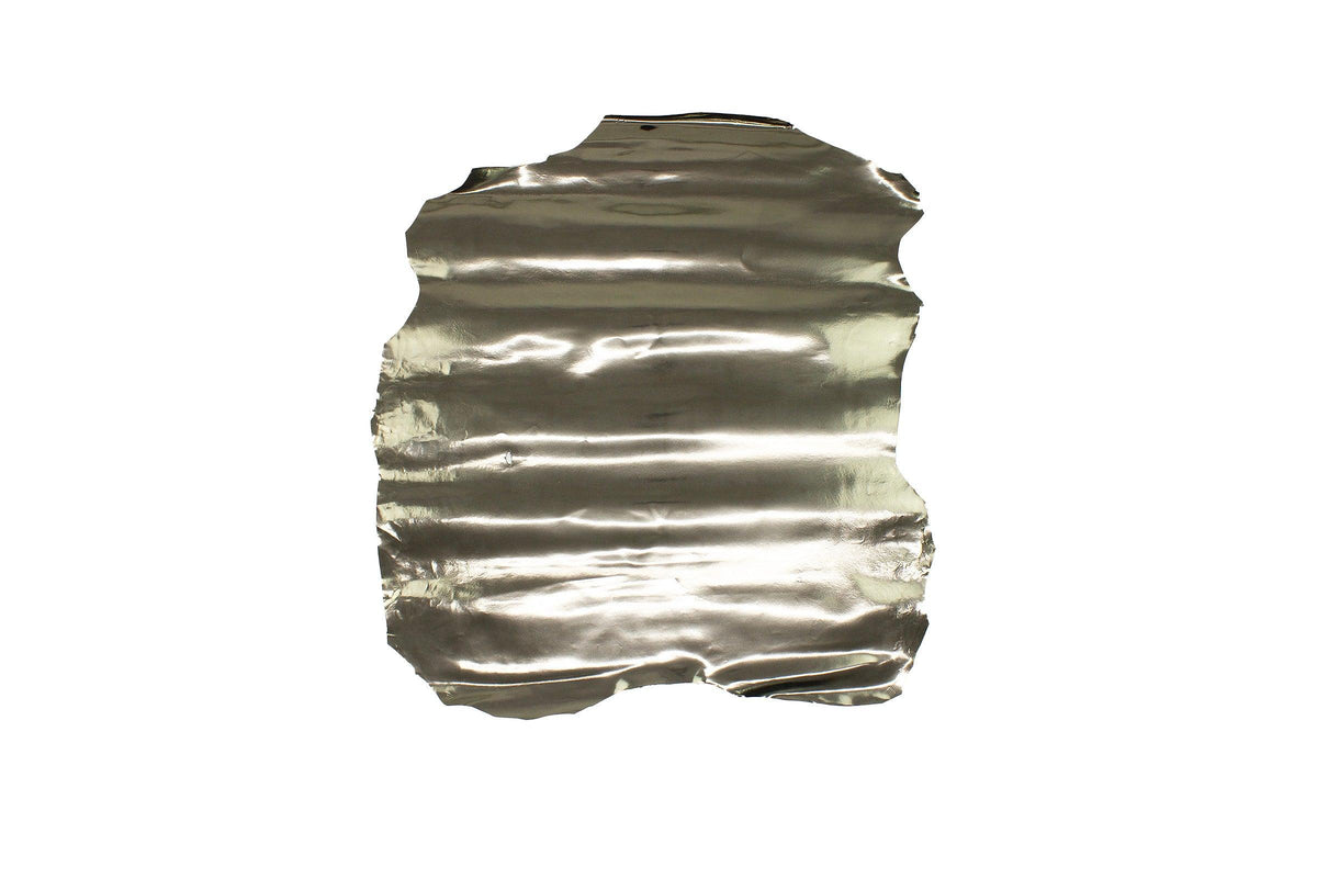 Piece of laminated pewter mirror goat leather
