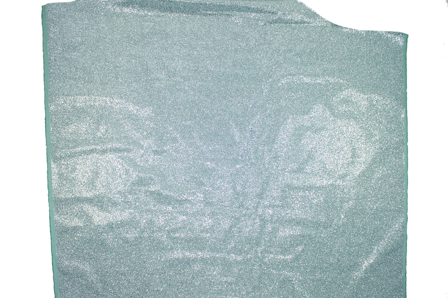 Trozo de tejido purpurina plata