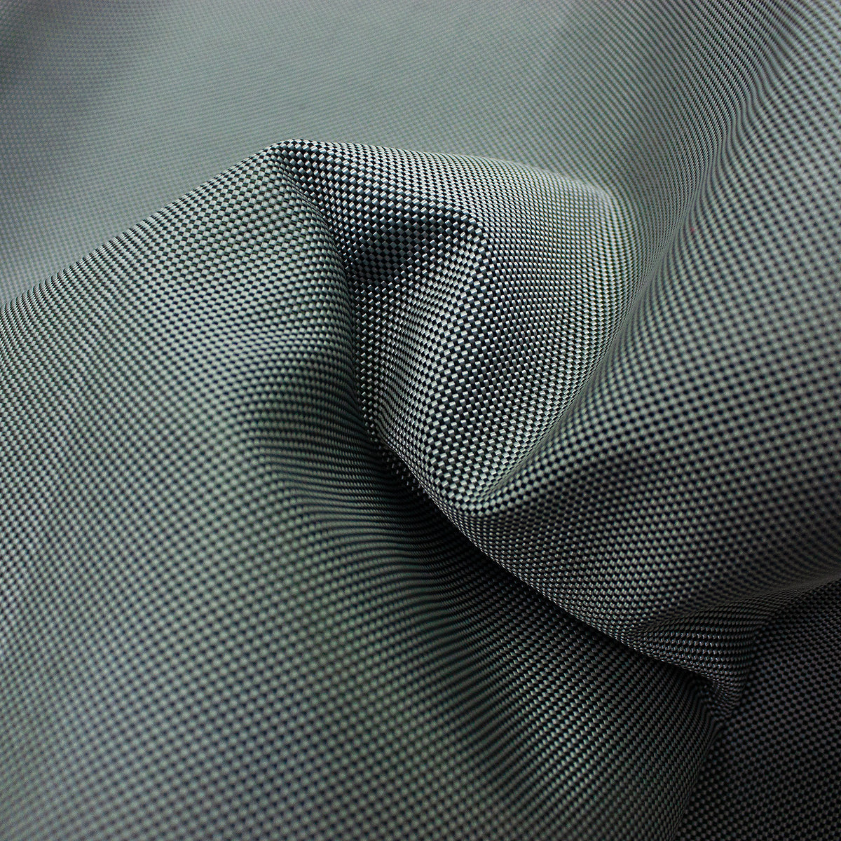 Trozo de tejido rejilla gris negro