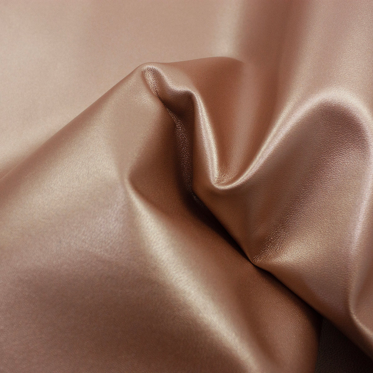 Trozo de piel cabra laminada oro rosa