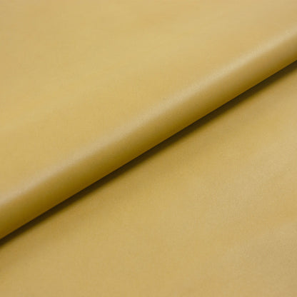 Trozo de piel cordero amarillo mostaza