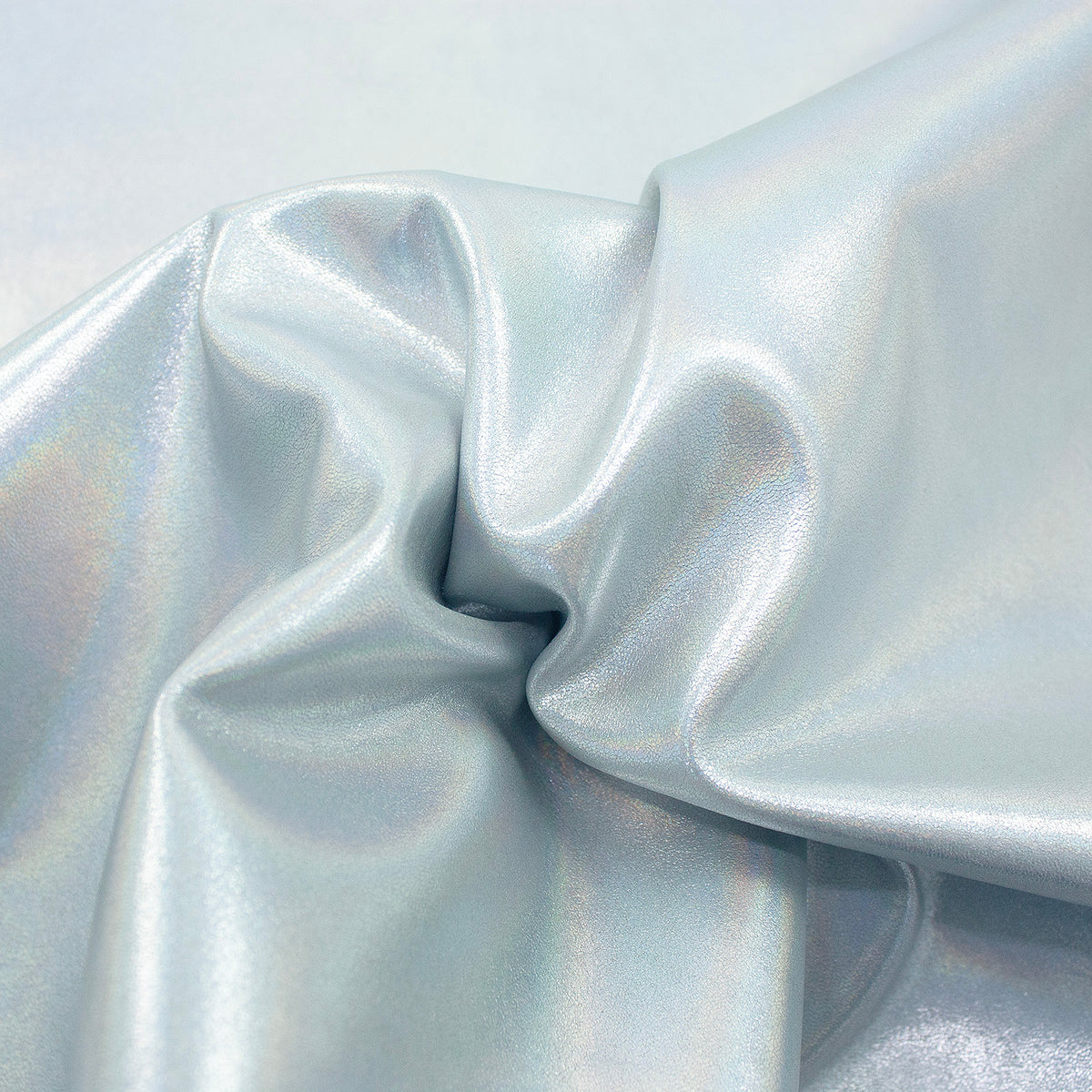 Trozo de piel cordero laminado plata tornasol
