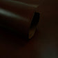 Piece of aged brown cowhide leather