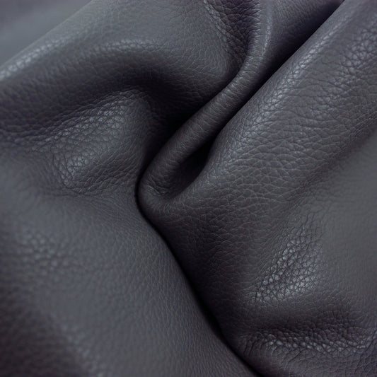 Piece of dark gray engraved bovine leather