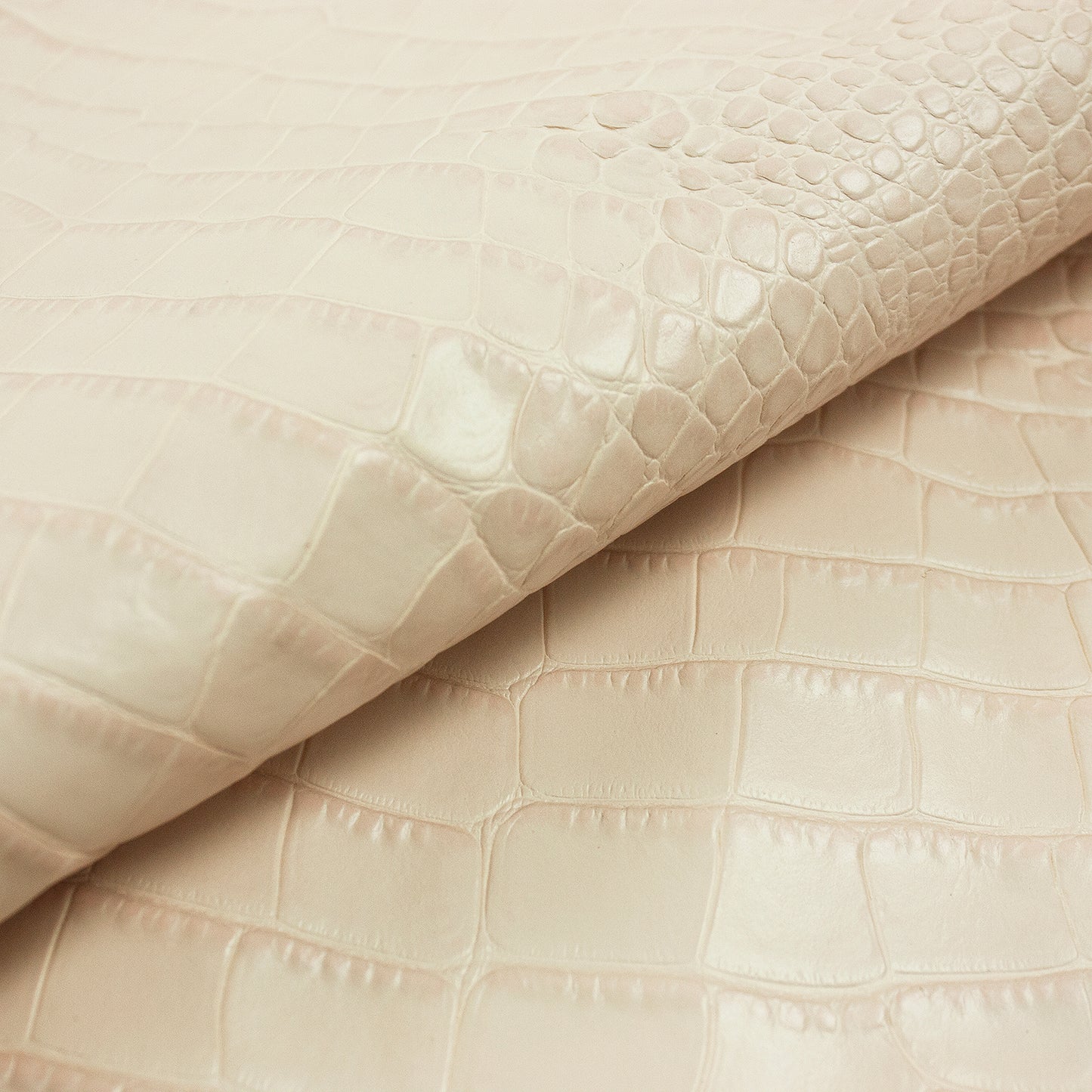 Pastel pink crocodile embossed skin