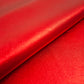 Piece of pumped bovine leather laminated electric red