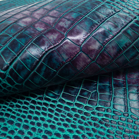 Trozo de piel grabado cocodrilo tonos turquesa - morado