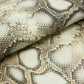 Trozo de piel grabado serpiente piton beige reflejos dorados