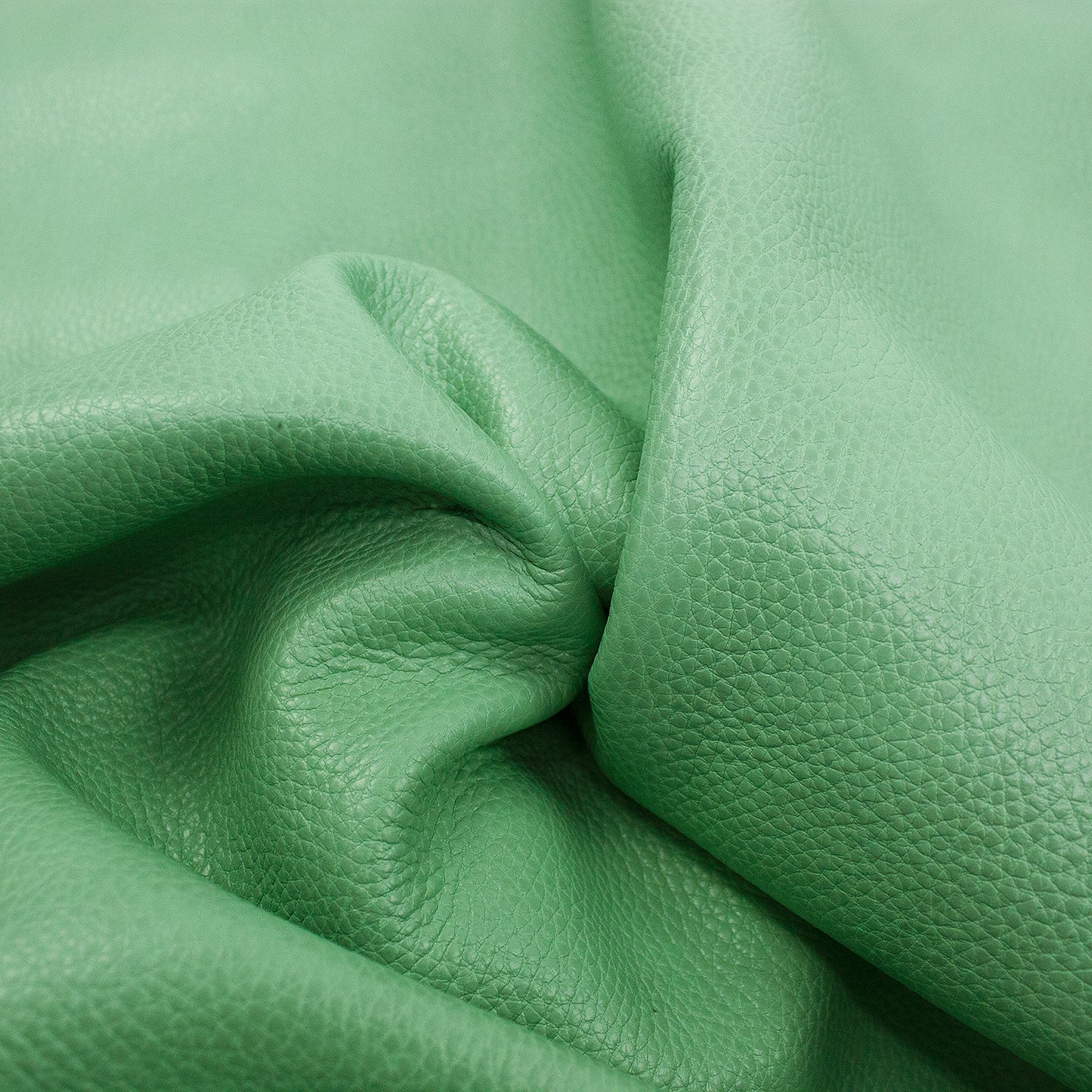 Piece of cowhide embossed with smoked aquamarine