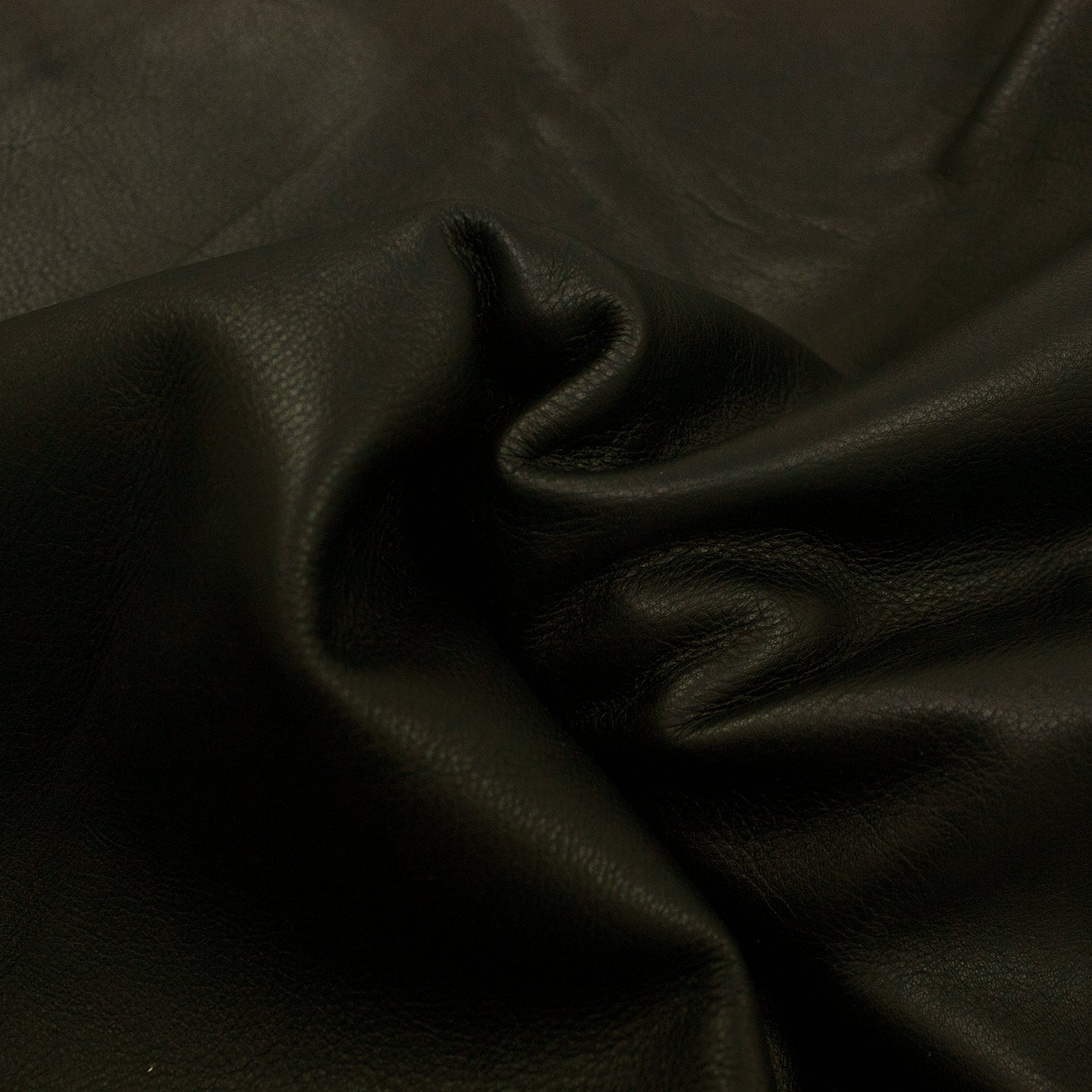 Piece of black pumped cowhide