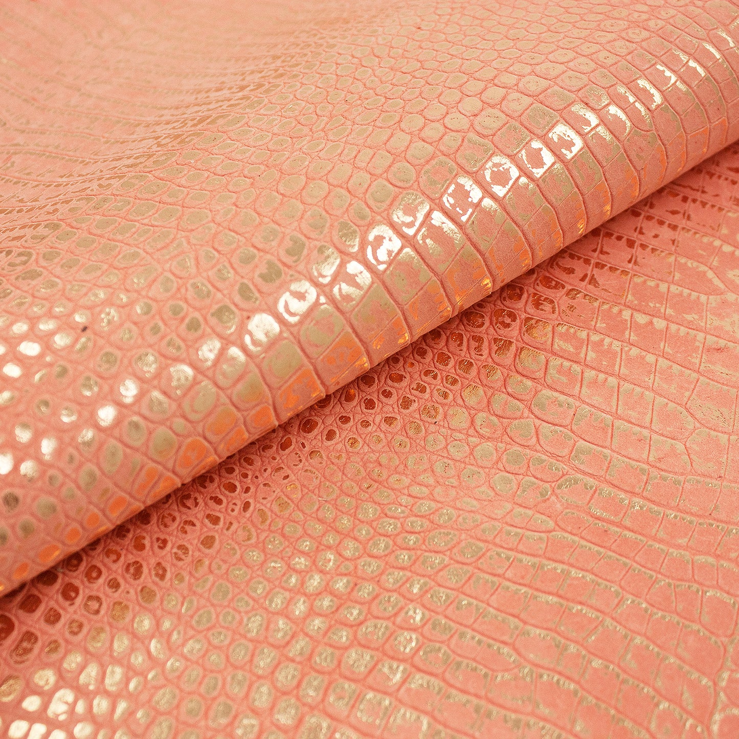 Rose gold crocodile embossed leather piece