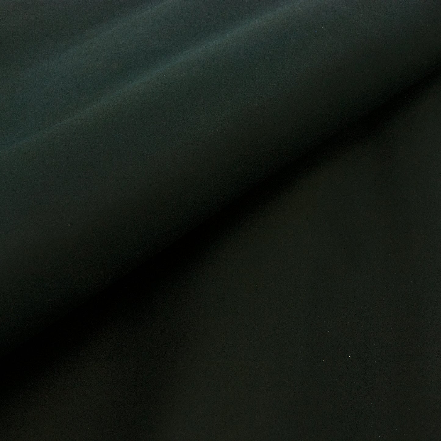 Piece of dark blue ironed split leather