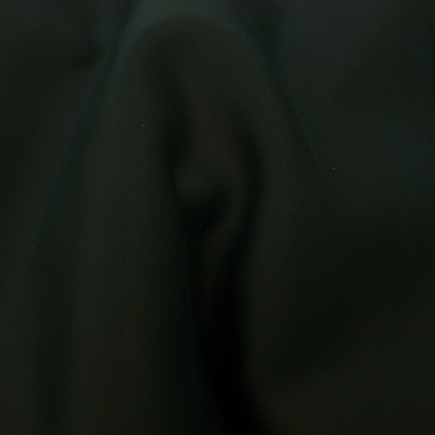 Piece of dark blue ironed split leather