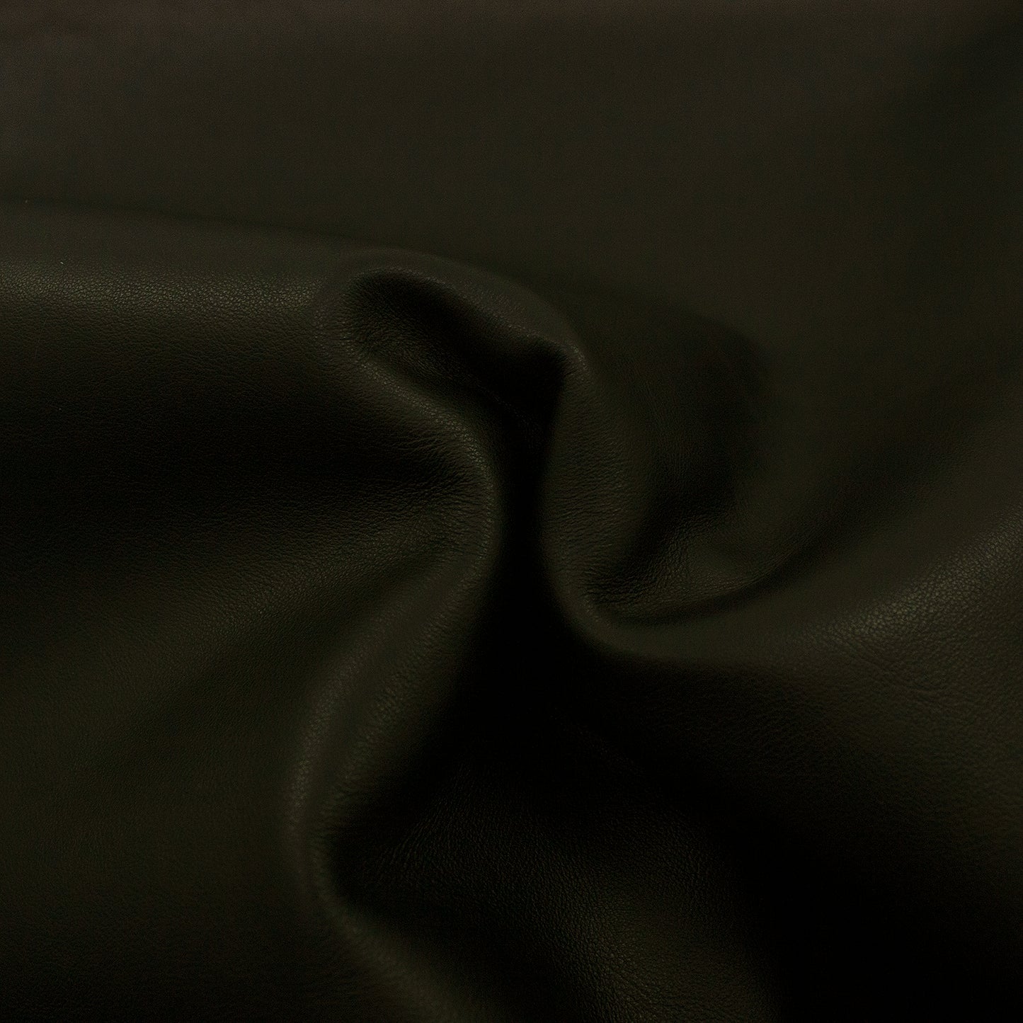 Piece of black pumped cowhide