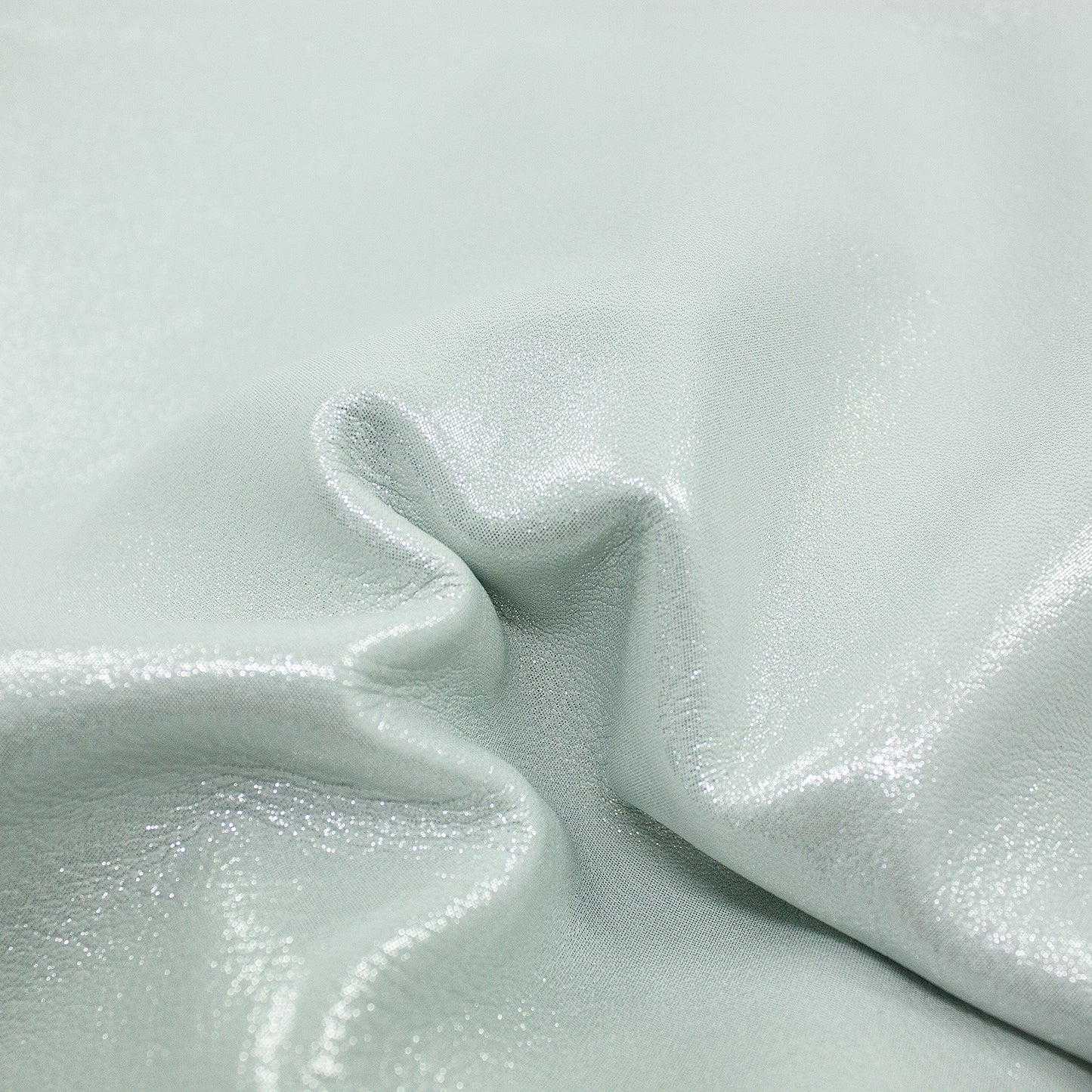 Piece of fancy leather with old gold satin effect