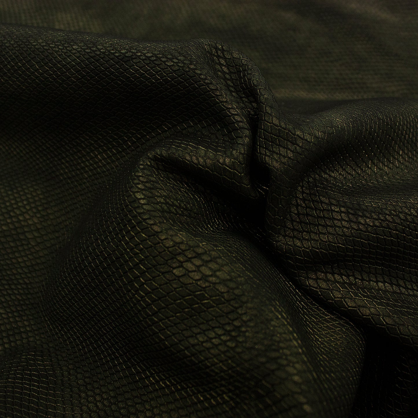 Piece of dark grey metallic snake embossed leather