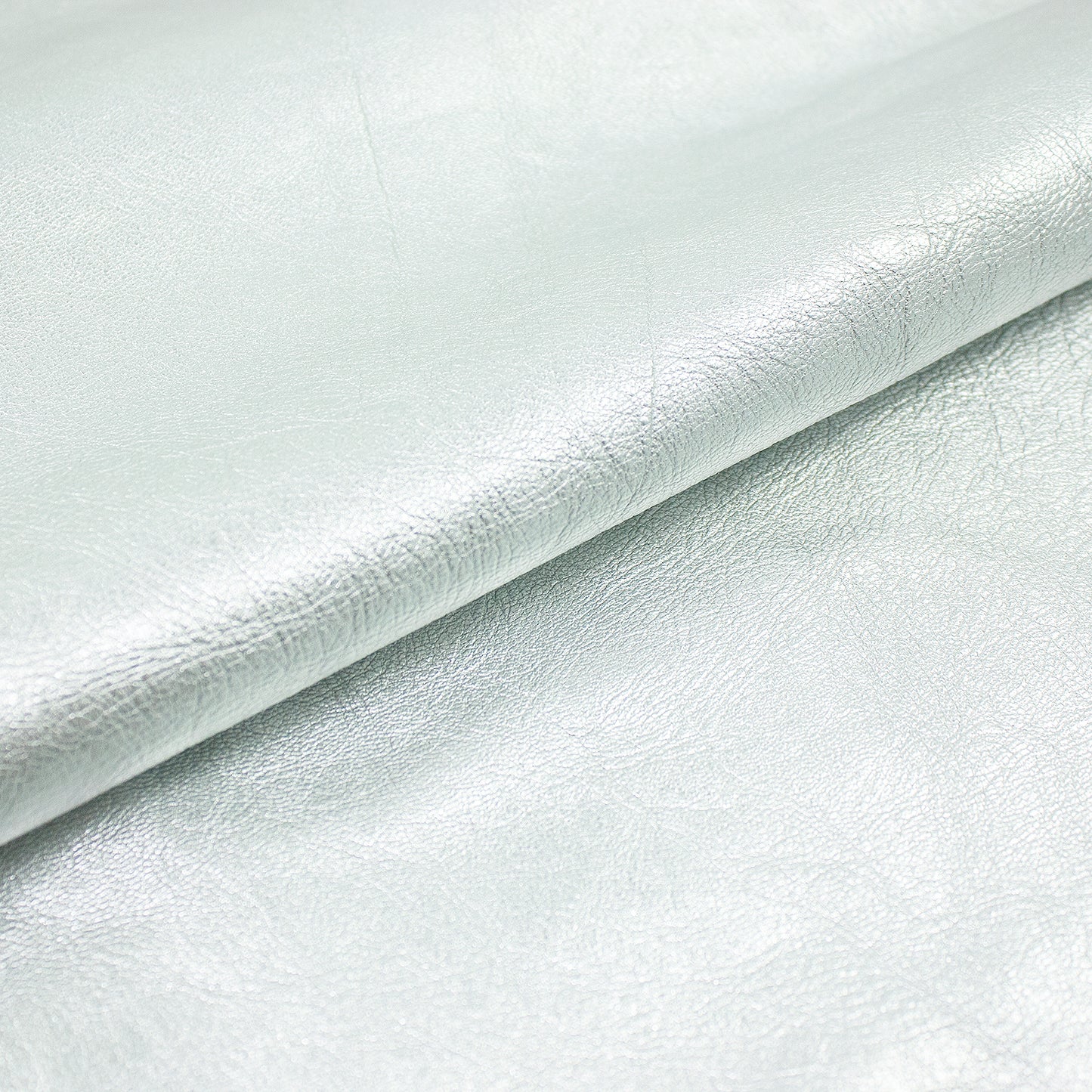 Piece of rustic lambskin laminated in silver