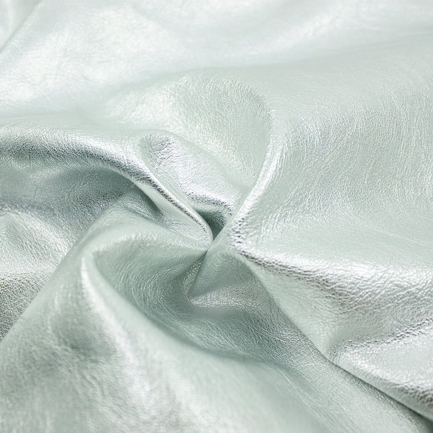 Piece of rustic lambskin laminated in silver