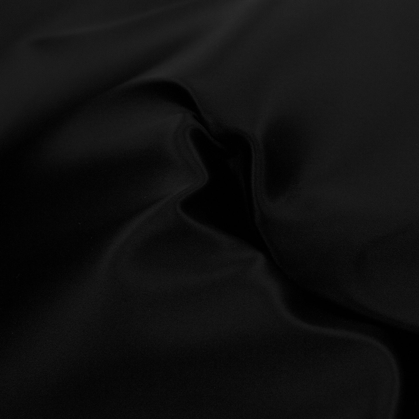 Tejido raso negro - reves felpa azul