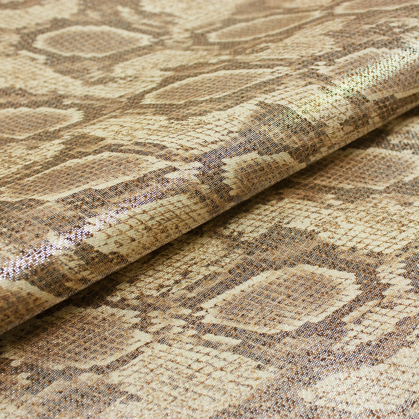 Tejido fantasia serpiente tonos marrones