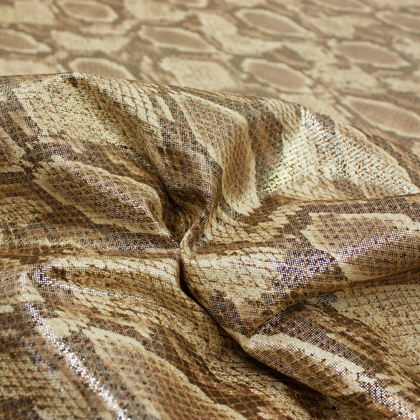 Tejido fantasia serpiente tonos marrones