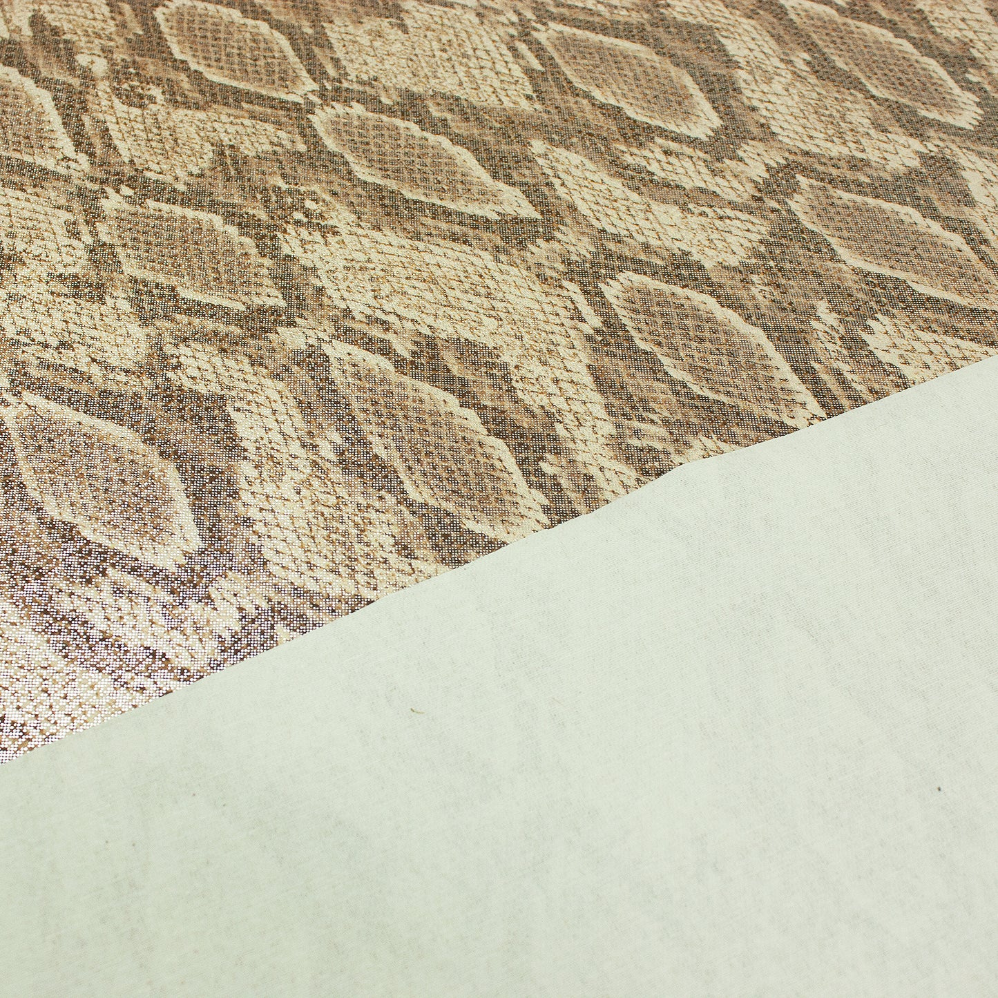 Tejido fantasia serpiente tonos marrones