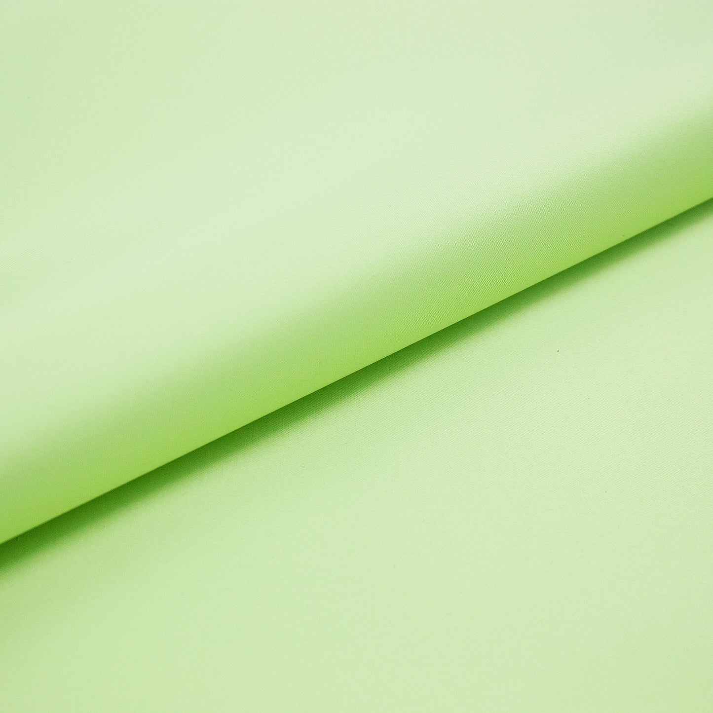 Tejido raso verde pastel