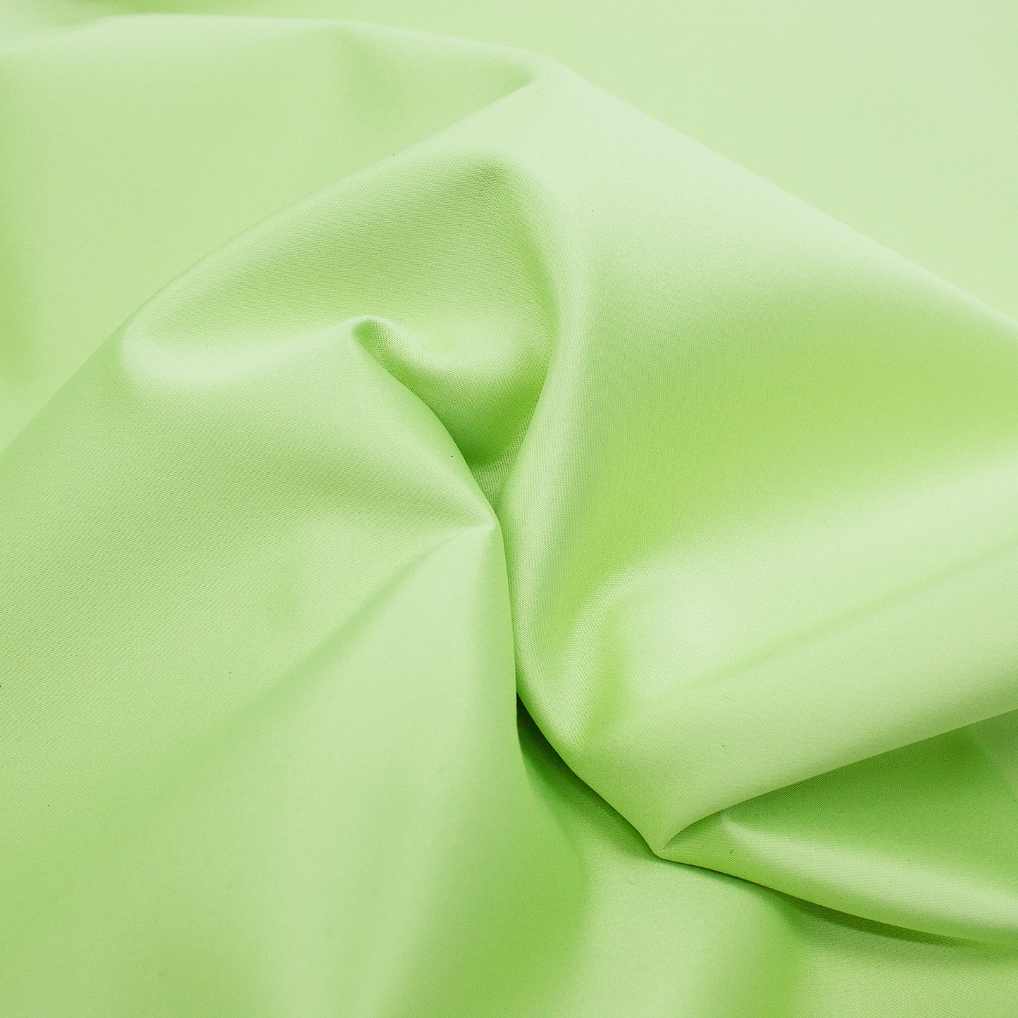 Tejido raso verde pastel