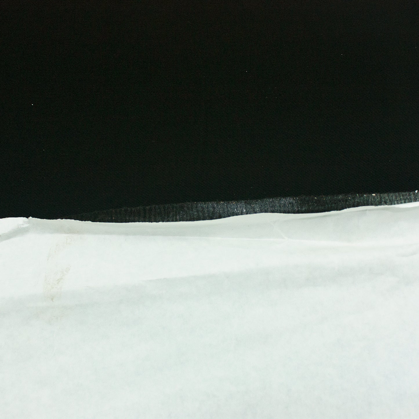 Entretela termoadhesiva negra 0.5 mm