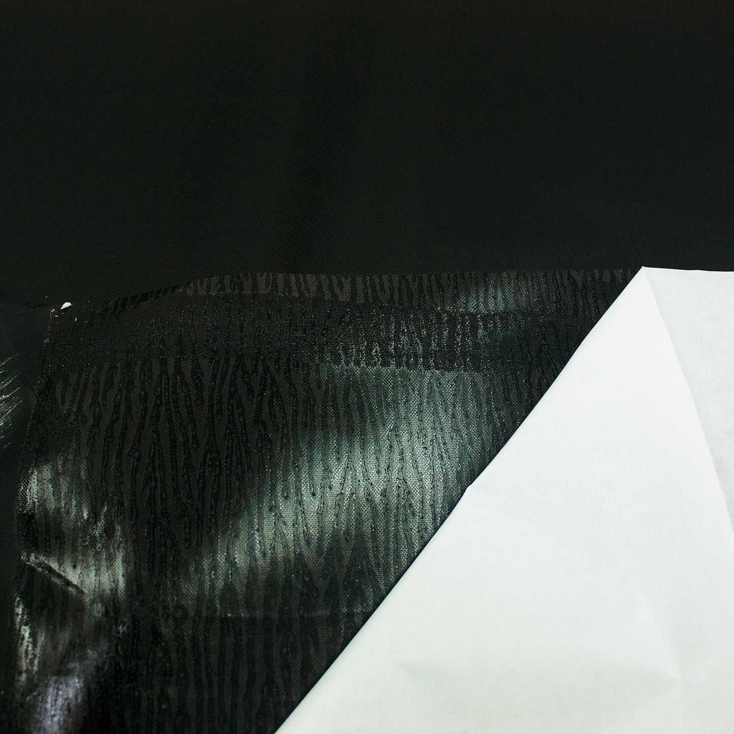 Entretela adhesiva negra 0.3 mm