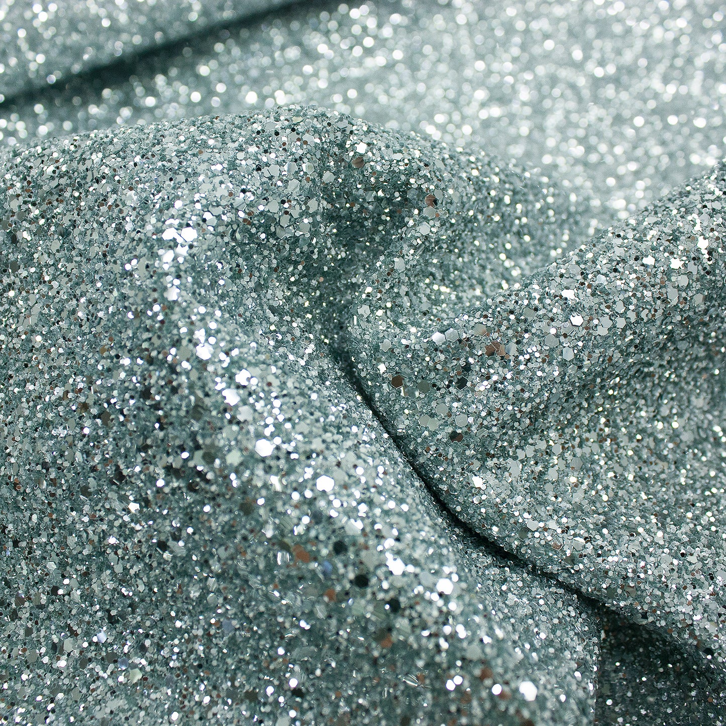 Trozo de tejido purpurina plata