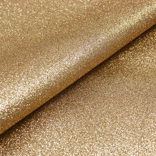 Trozo de tejido purpurina dorada