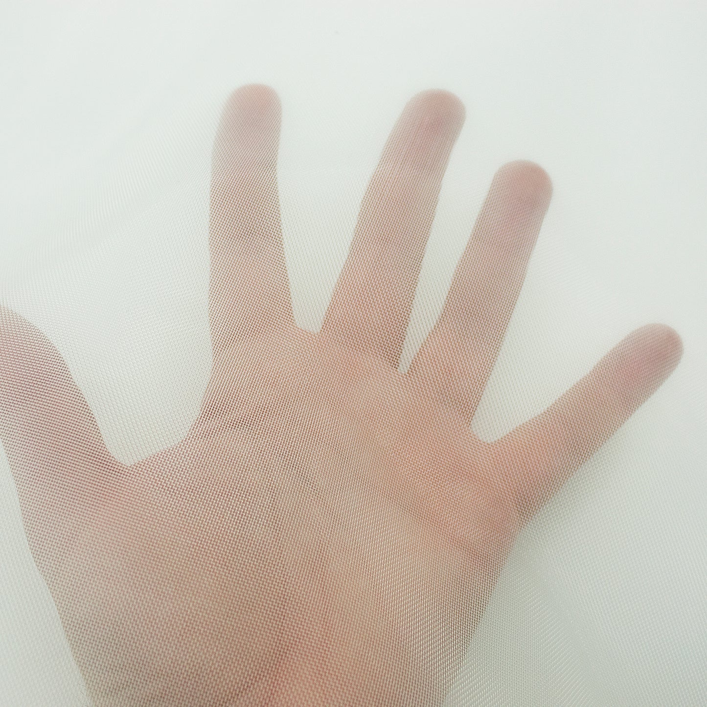 Trozo de tejido rejilla blanca