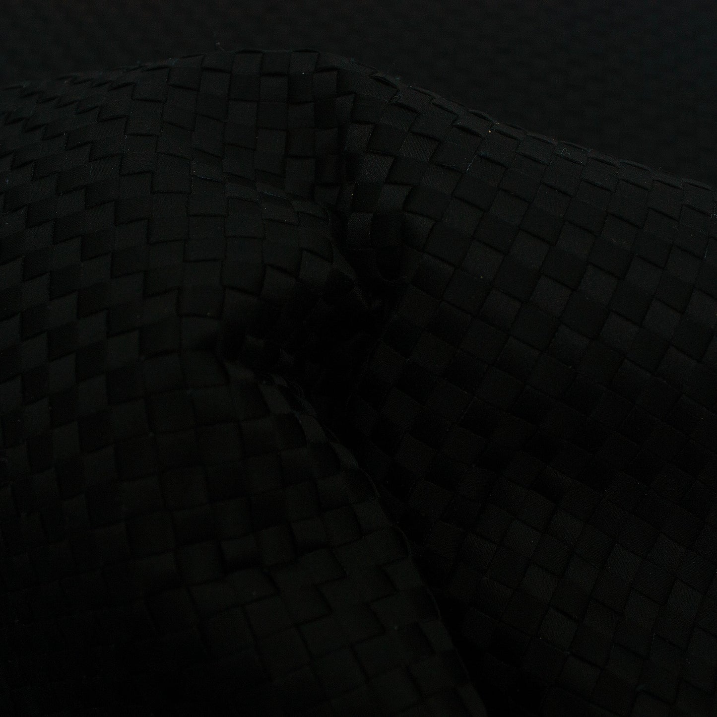 Trozo de tejido trenzado raso negro