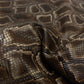 Piel de grabado serpiente marron