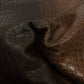 Trozo de piel grabado coco marron autolucido