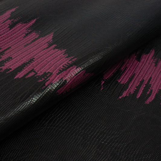 Piel de grabado tejus negro franja fucsia