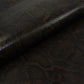 Trozo de piel grabado serpiente marron oscuro