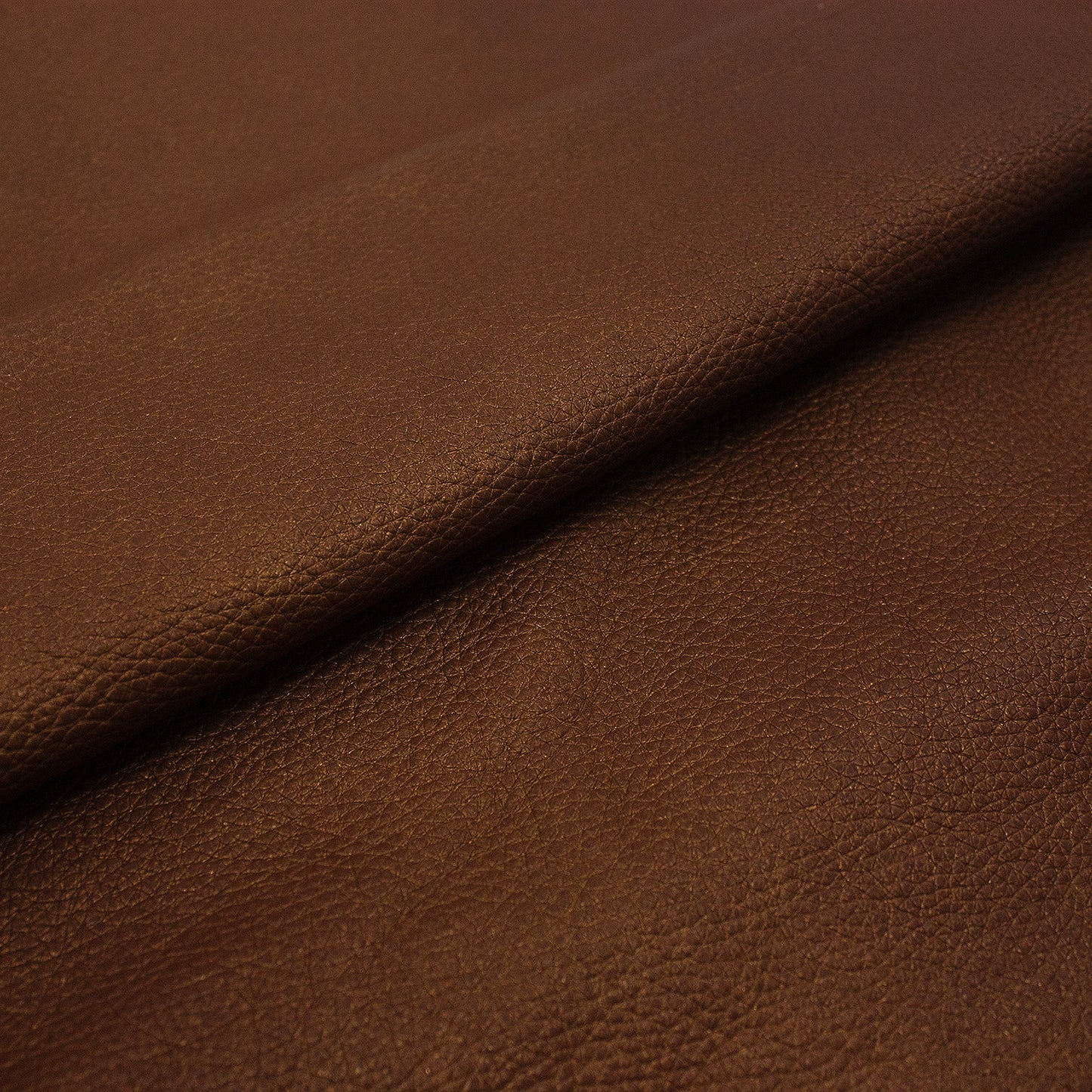 Trozo de piel fantasia bronce reflejos oro