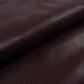 Aged mahogany brown cowhide leather piece