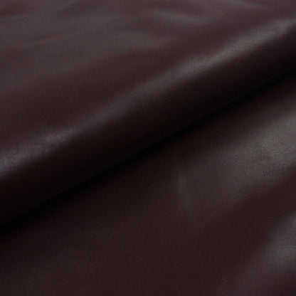 Aged mahogany brown cowhide leather piece