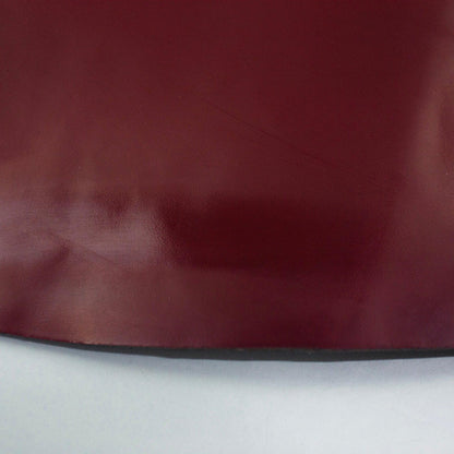 Florentine auto-shined garnet cowhide leather piece