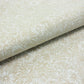 Piece of beige floral fantasy leather