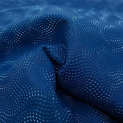 Piece of engraved leather, blue waves