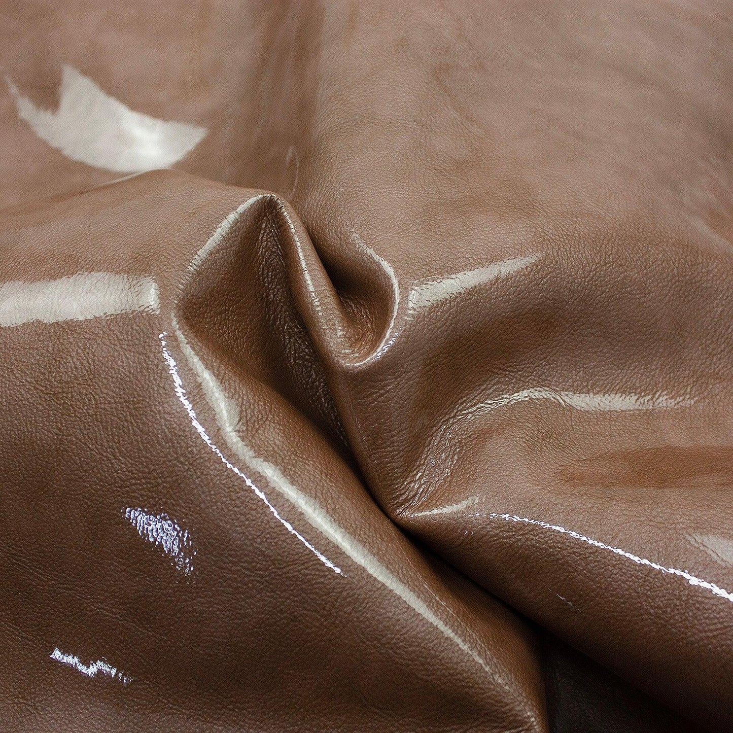 Piece of rustic sand patent leather