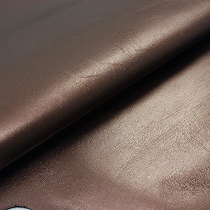 Piece of bronze goatskin lining