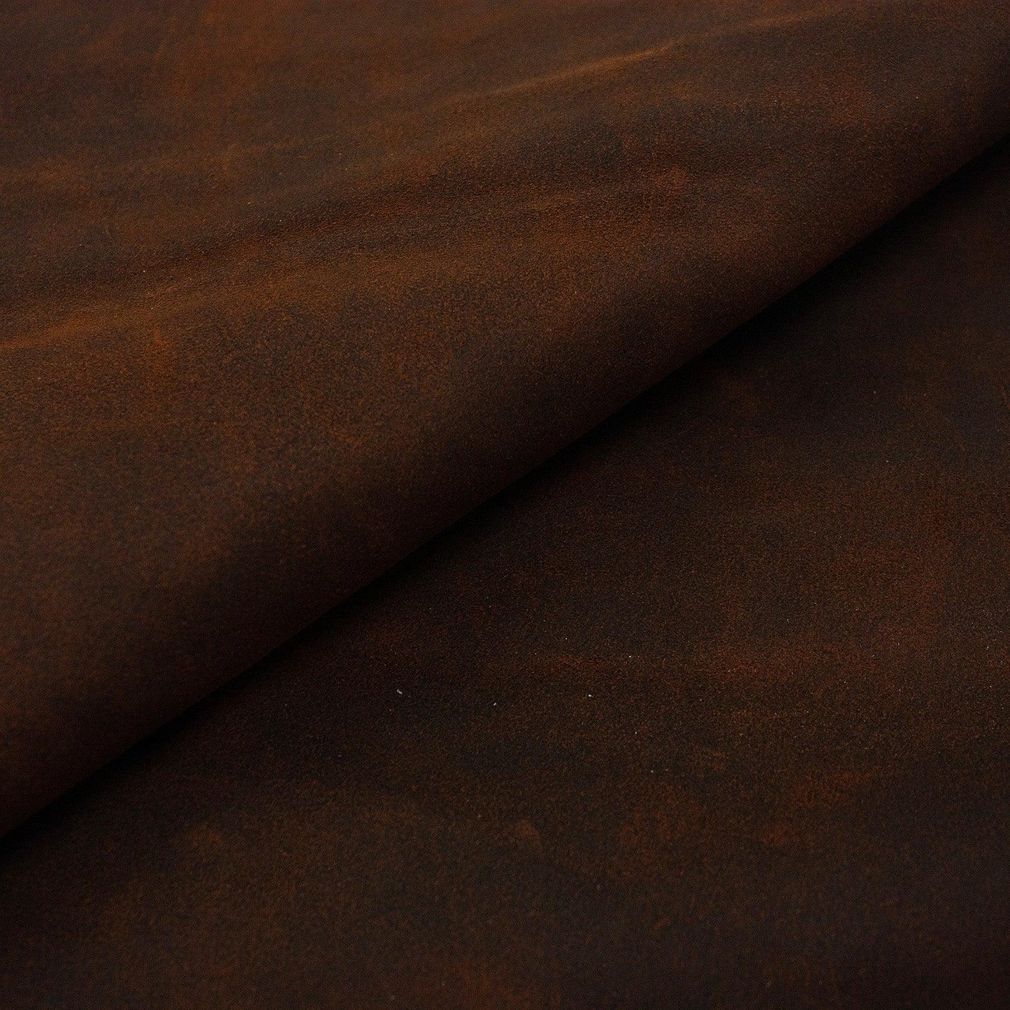 Piece of oiled brown Western split leather