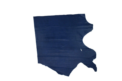 Piece of worn blue fantasy leather