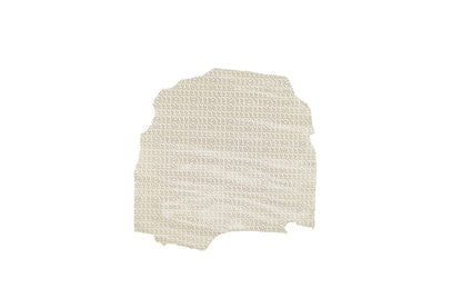 Piece of faux leather with brown polka dots